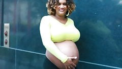 pregnant street-A mother who loves her pregnant belly